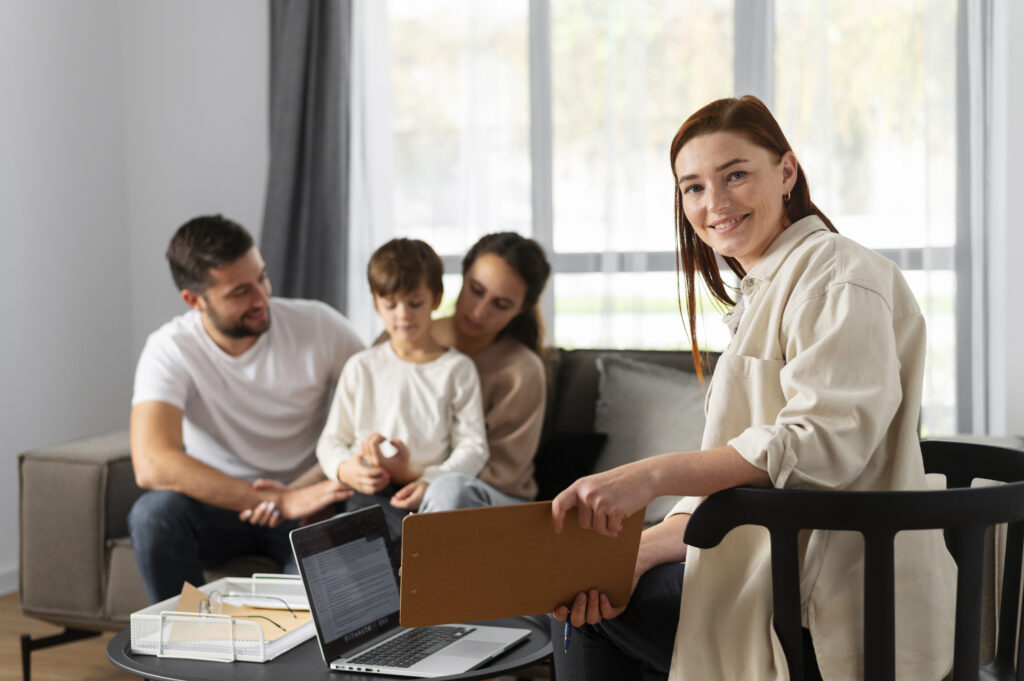 Family therapy session with a therapist and family members