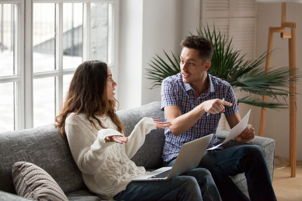 Couple discussing relationship conflict during therapy