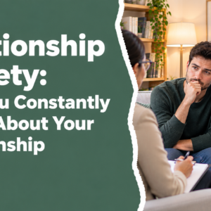 Relationship Anxiety – A worried couple wearing dark green and lavender sweaters discussing relationship concerns with a therapist in a warm, comfortable counseling office.