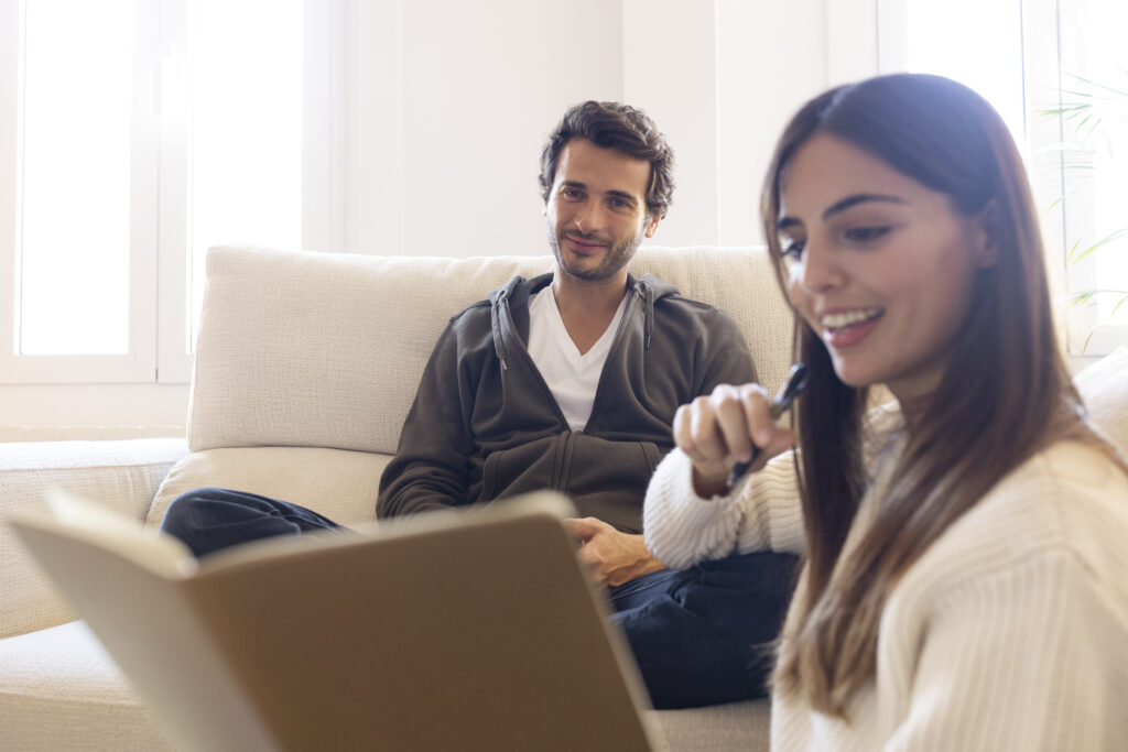 Couple participating in a virtual therapy session from home