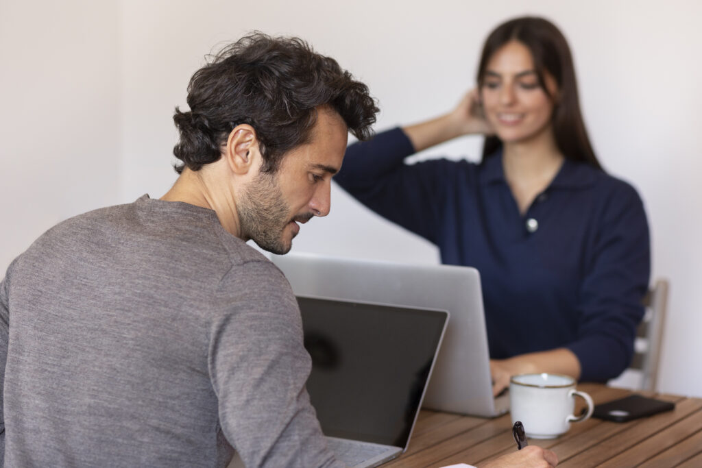 Man and woman discussing work-related stress
