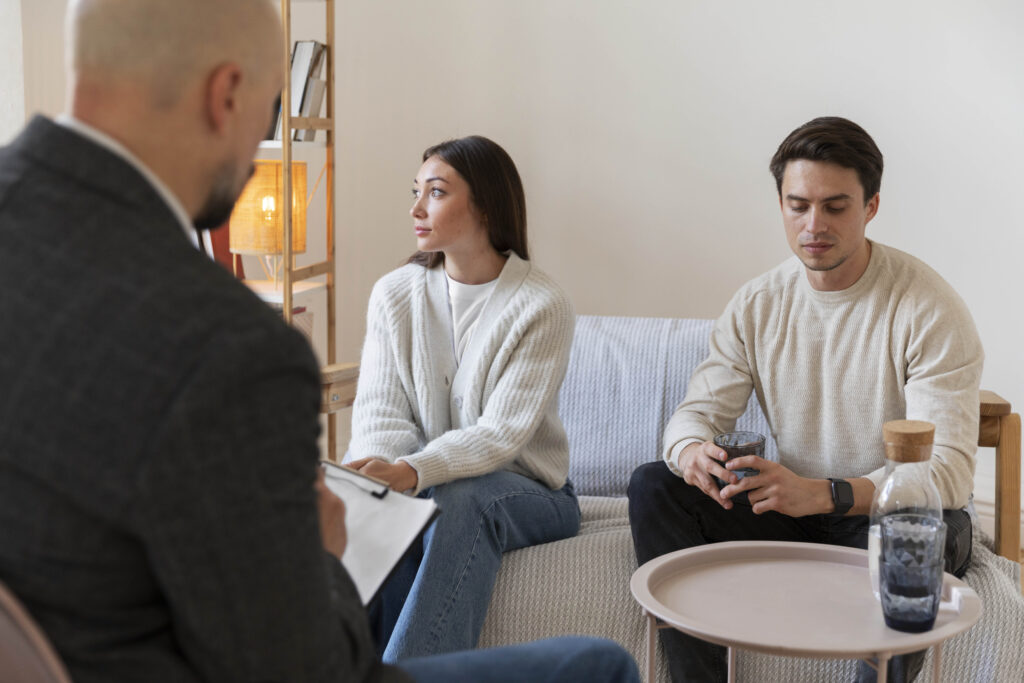 Couple discussing treatment goals with a therapist