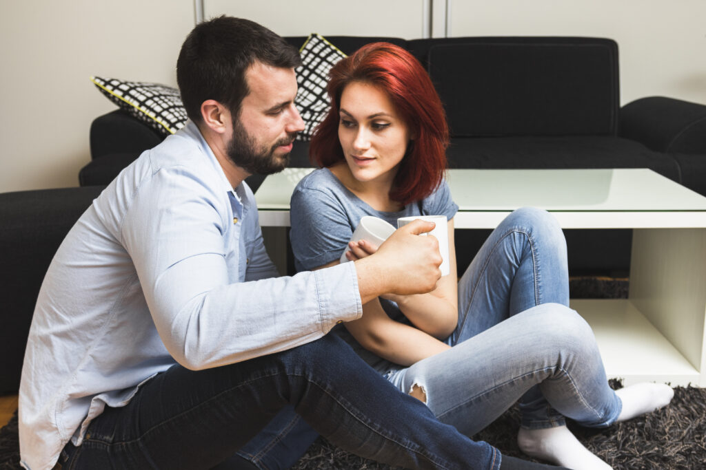 Couple having a calm conversation at home