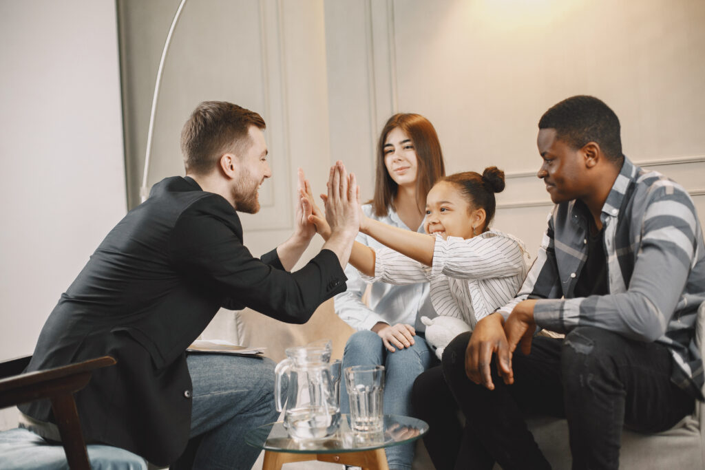 Family therapy session with parents and child